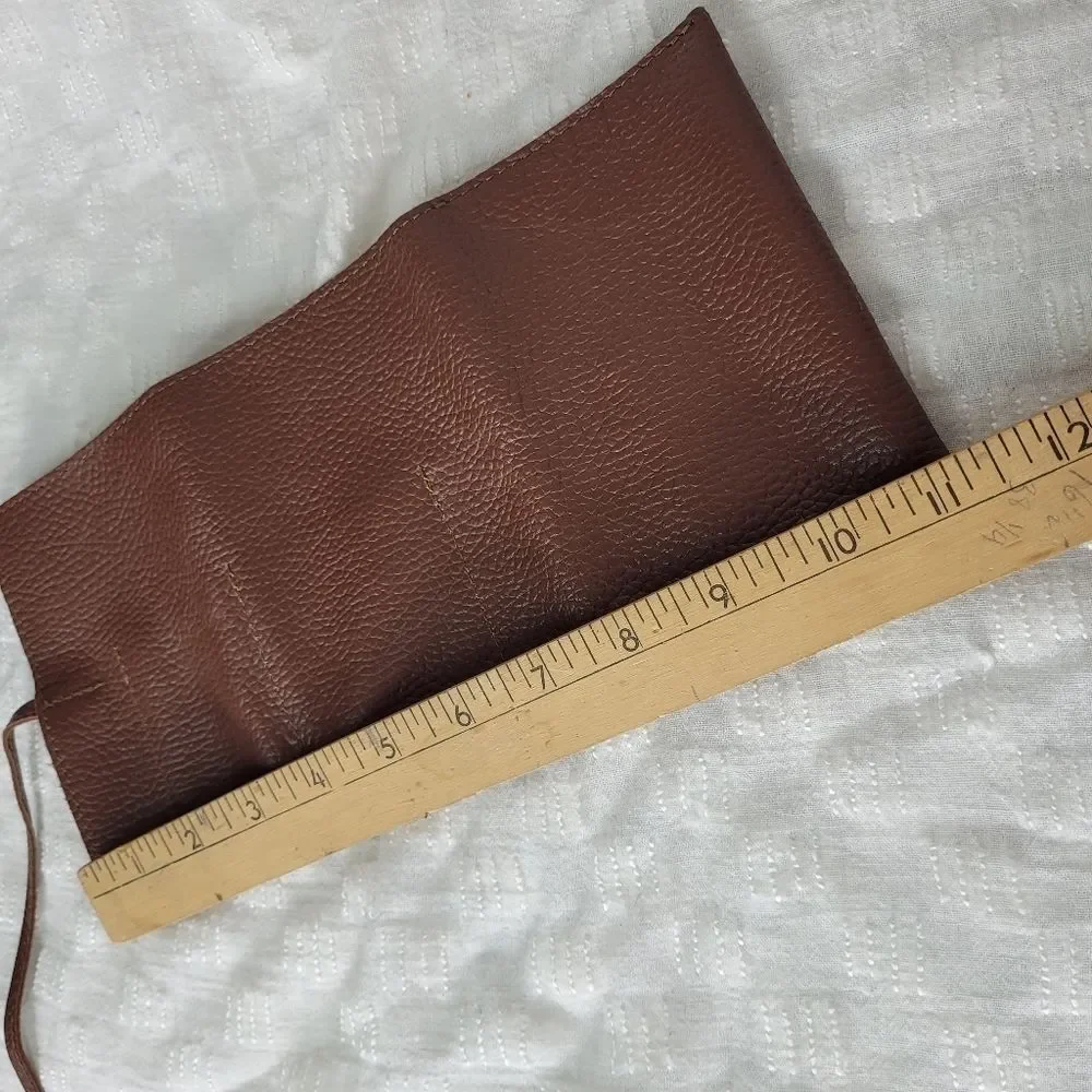 Mark & Graham brown pebbled leather charger rollup pockets tie closure minimal
